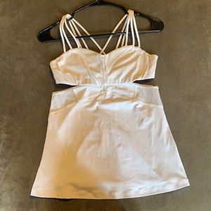 White lululemon top with multi straps and mesh